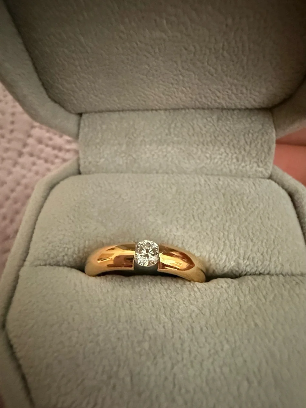 Ashley Zhang tension set diamond ring in  18 karat yellow gold